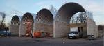 Warehouse shelters with arched roofs