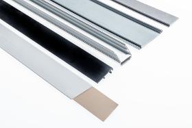 Co-extruded thermal cut profiles with metal