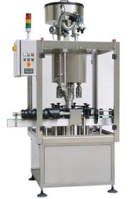 Rotary capping machines for screw or crown caps