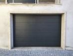 SECTIONAL DOOR; GARAGE DOOR; MOTORIZED GATE