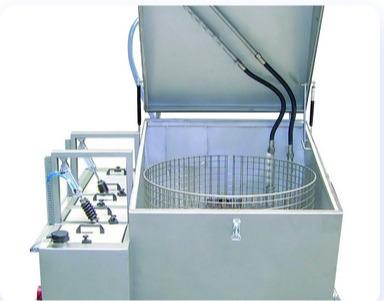 Rotating spray washing machines