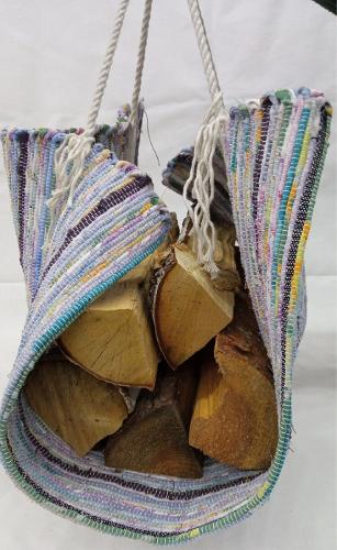  Recycled firewood canvas carrier.