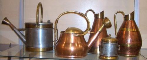 copper watering can