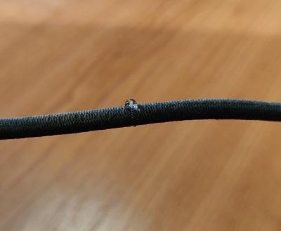 Elastic cord with hydrophobic treatment